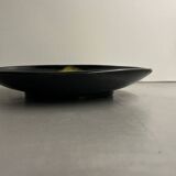 Wall plate by Pol Chambost with leaf pattern.