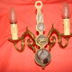 Pair of bronze wall lights with 2 arms in "Dutch" style.
