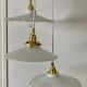 Three-light cascading pendant lamp with vintage white opaline lampshade