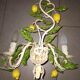 Wire wall lamp decorated with lemons