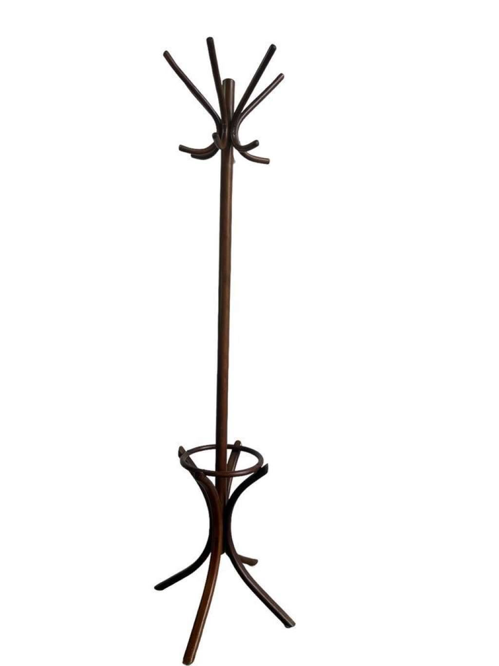 Vintage coat rack on floor in curved wood, thonet style