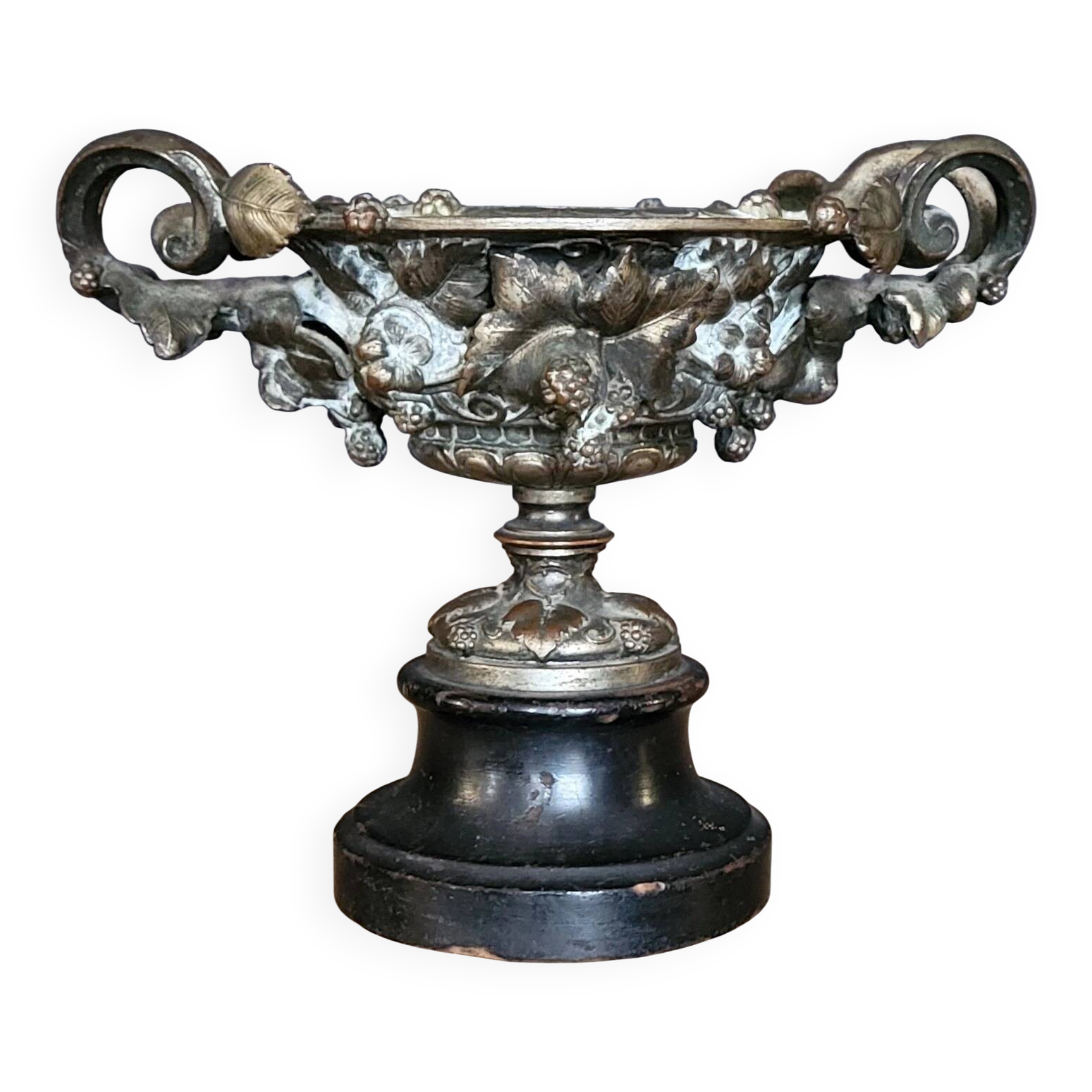 Patinated bronze cup, richly decorated with foliage and bunches of grapes