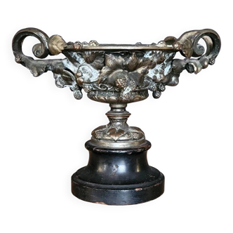 Patinated bronze cup, richly decorated with foliage and bunches of grapes