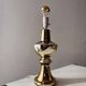Gilded ceramic table lamp by Gustav Leek, Luxus, 1960s.