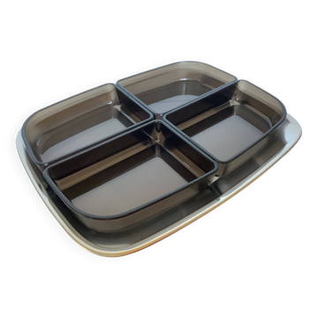 Serving platter for appetizers with four ramekins.