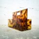 Vintage magazine rack in plexiglass and brass