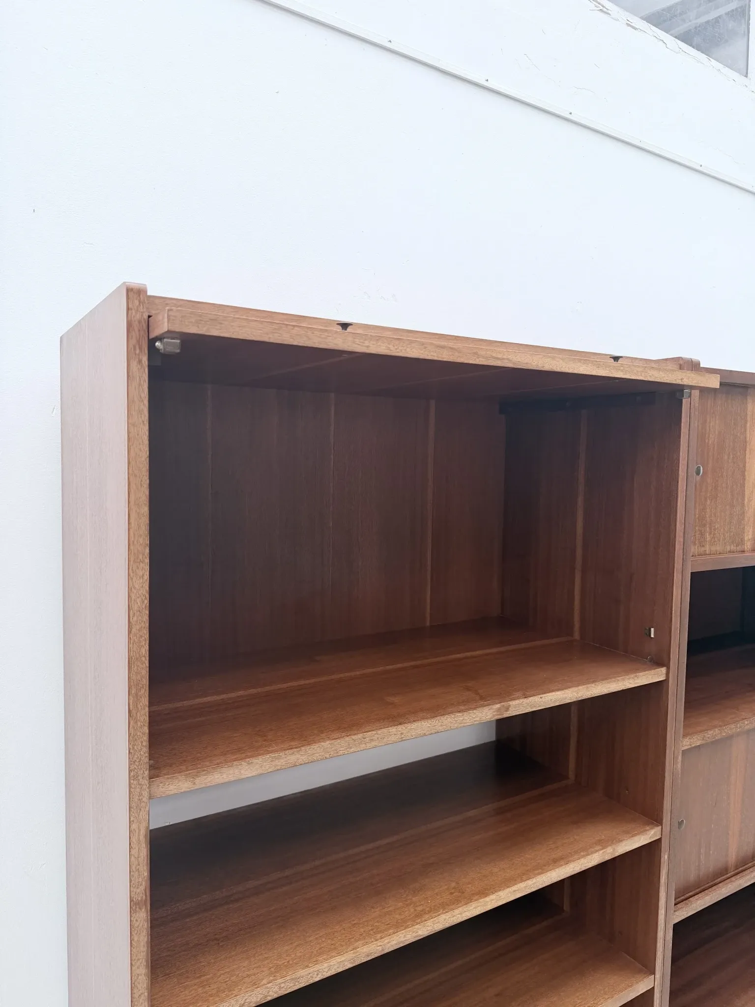 Scandinavian style bookshelf in teak and brass, 1950.