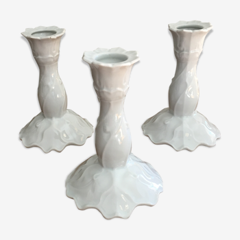 Trio of porcelain candlesticks