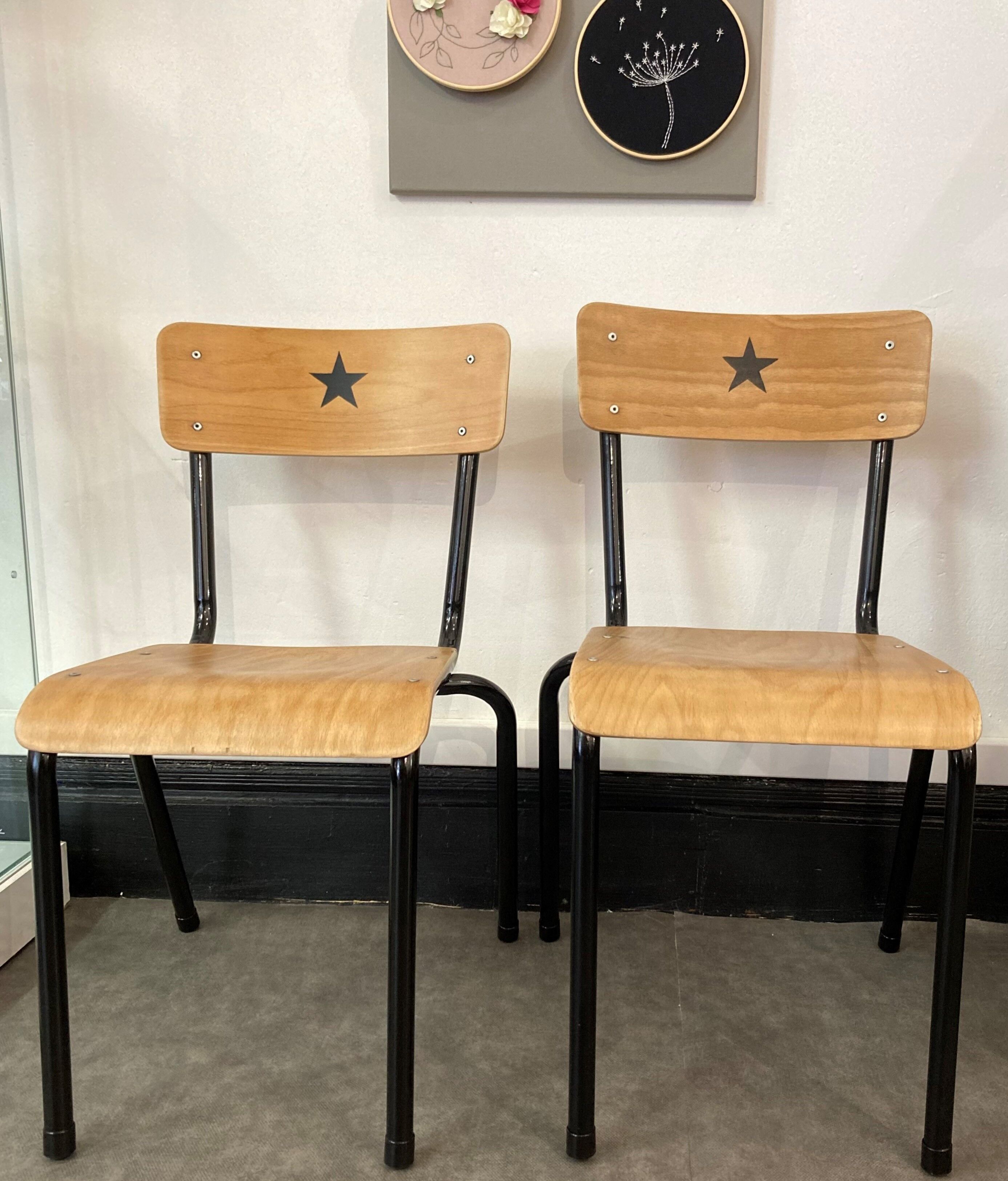 Pair of renovated school chairs with star pattern