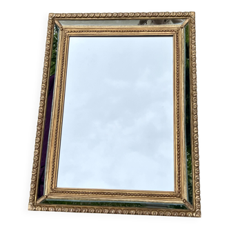 Miroir à parcloses en bois doré de style Louis XVI