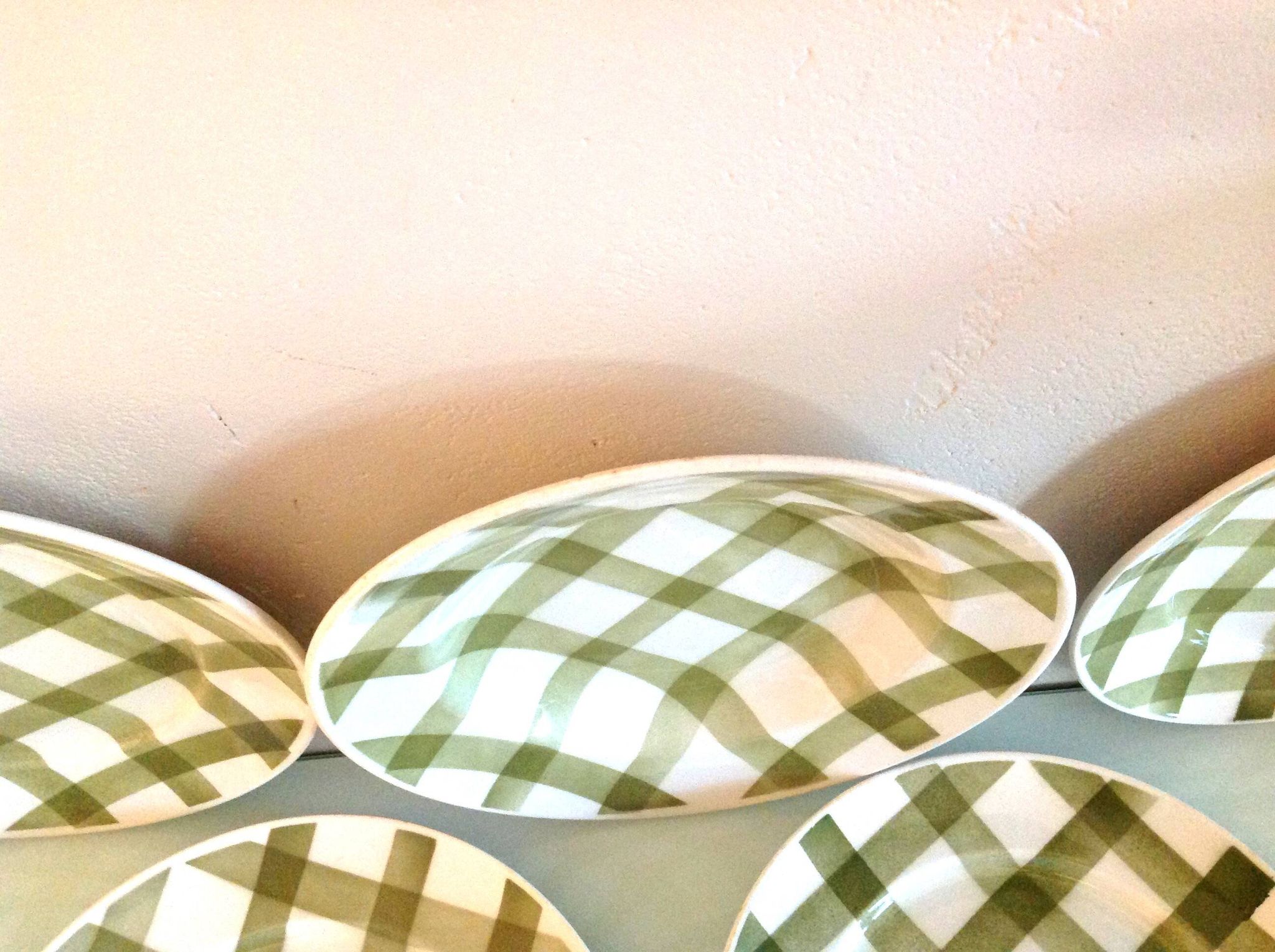 Set of six flat plates and one Moulin des Loups bowl, green tablecloth model/1950s-1960s