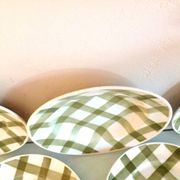 Set of six flat plates and one Moulin des Loups bowl, green tablecloth model/1950s-1960s