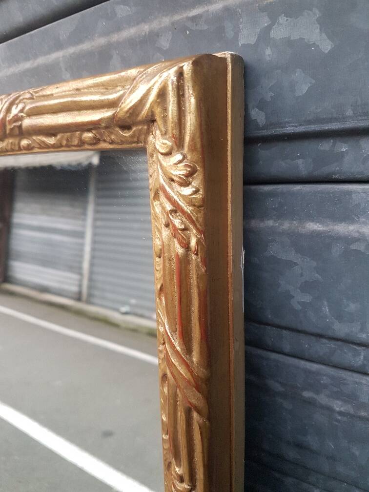 Golden mirror in louis xv style