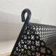 1950s black perforated metal planter in the style of Mathieu MATEGOT