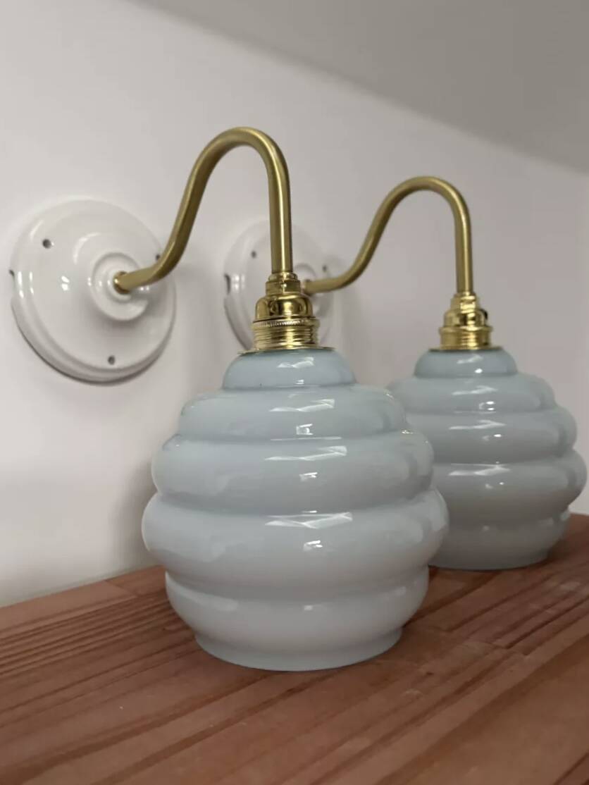Pair of blue swan neck wall lights