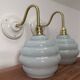 Pair of blue swan neck wall lights