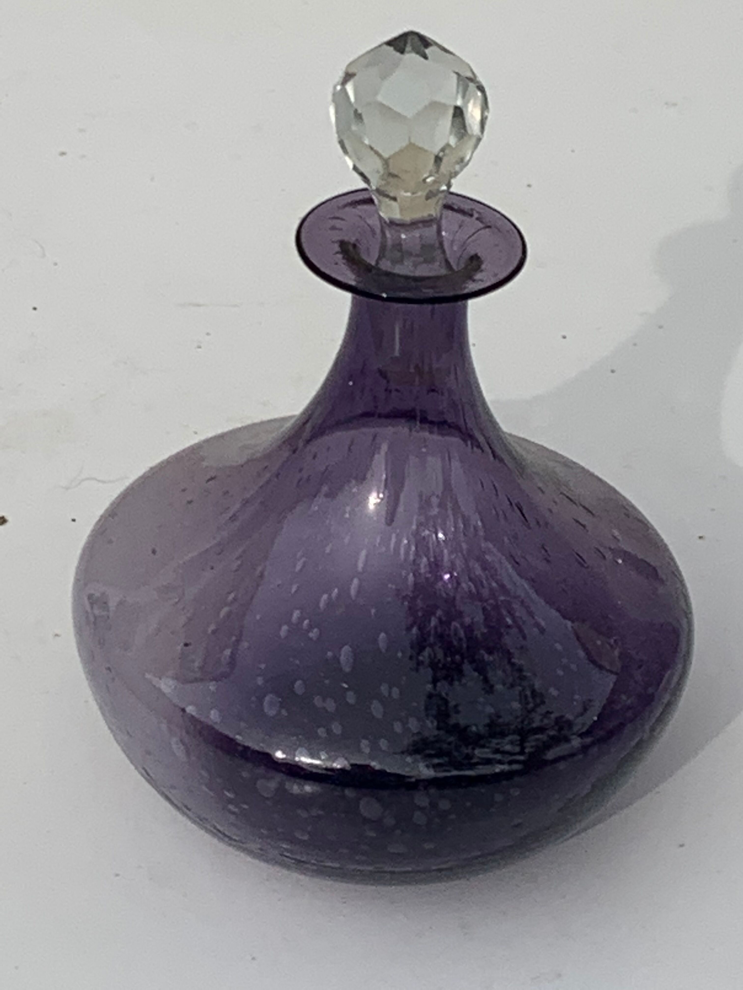Bubble and purple blown glass decanter and faceted cut glass cap