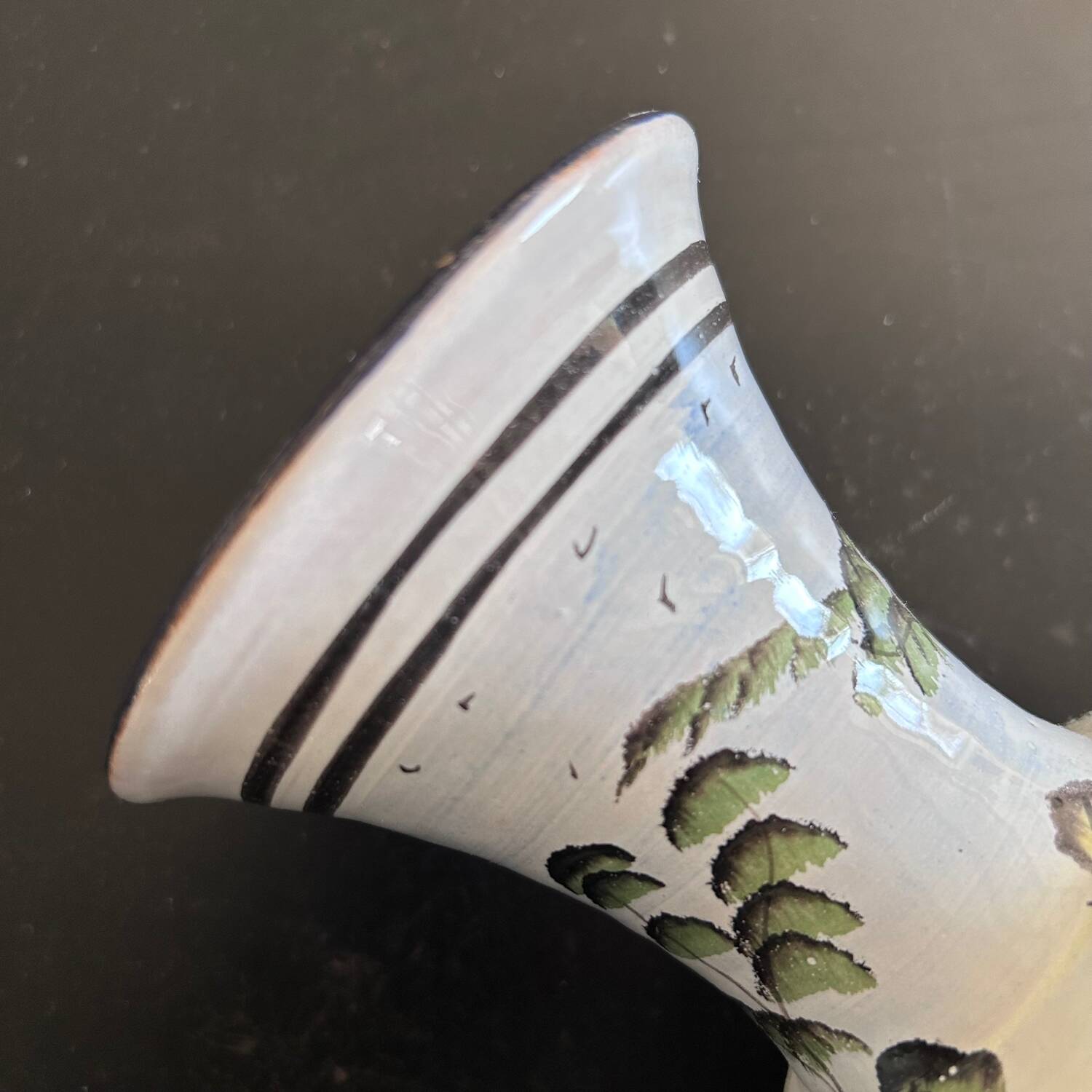 White vase with plant decoration