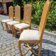 4 chaises en bois cérusé et dossier canné