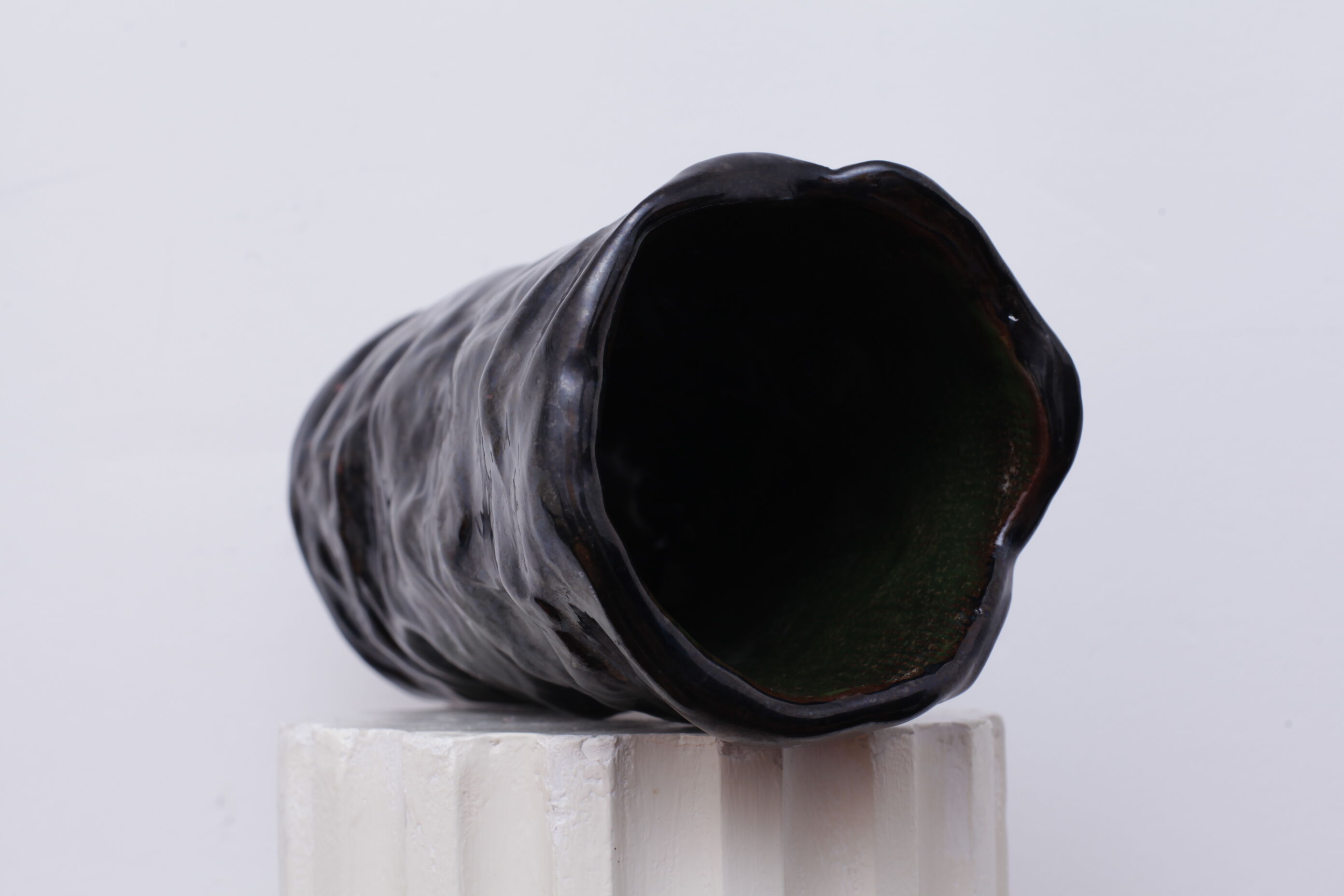 Thick black ceramic vase