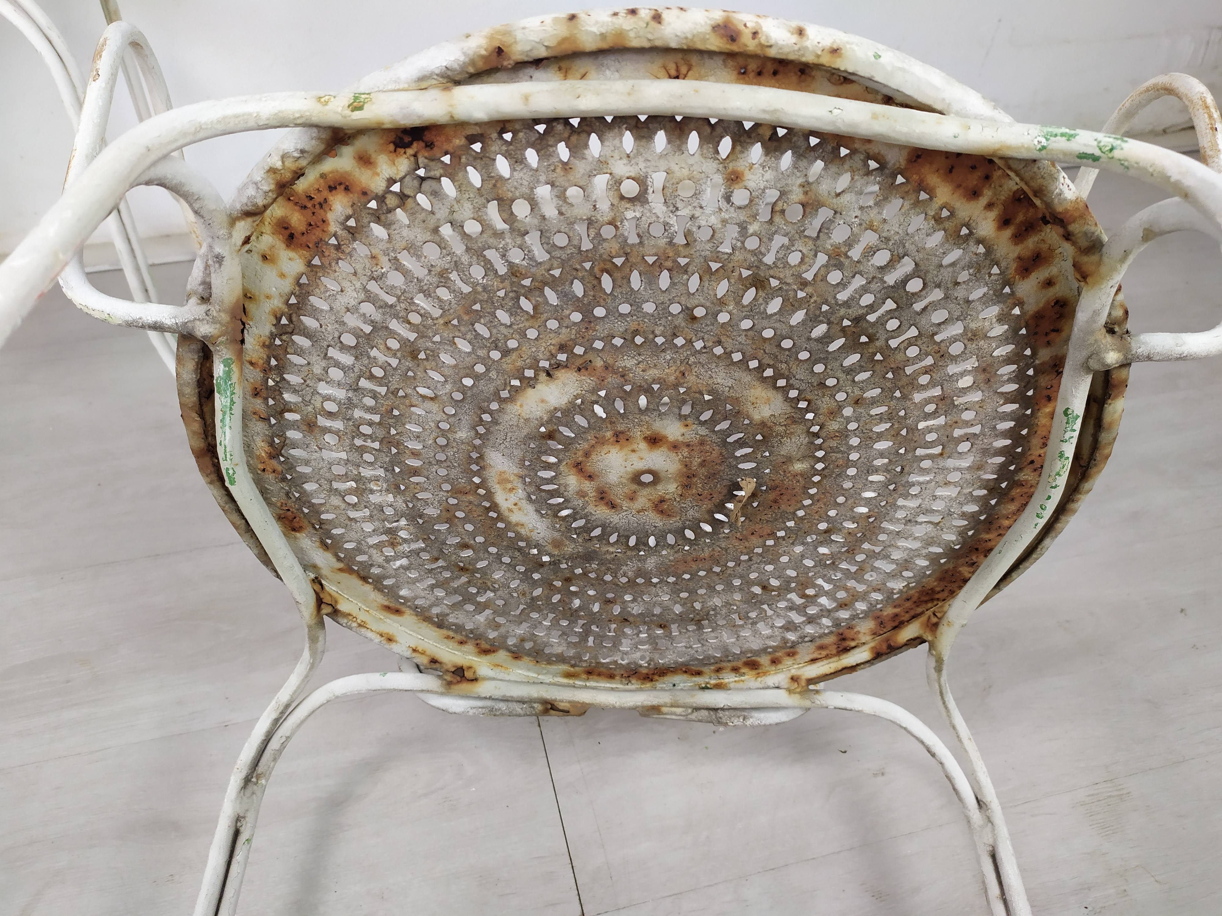 4 wrought iron garden armchairs