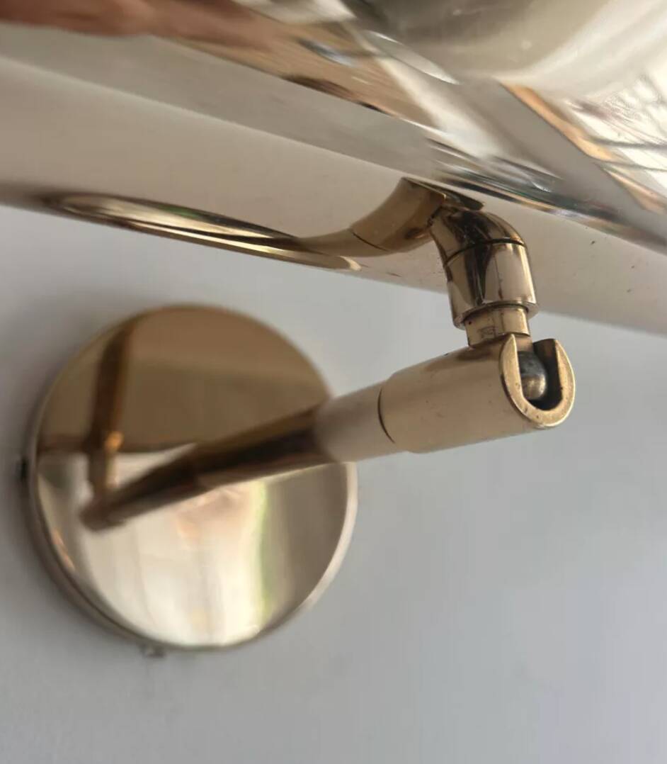Pair of vintage adjustable solid brass wall lights France 1970
