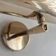 Pair of vintage adjustable solid brass wall lights France 1970
