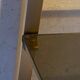 Golden brass and glass shelves