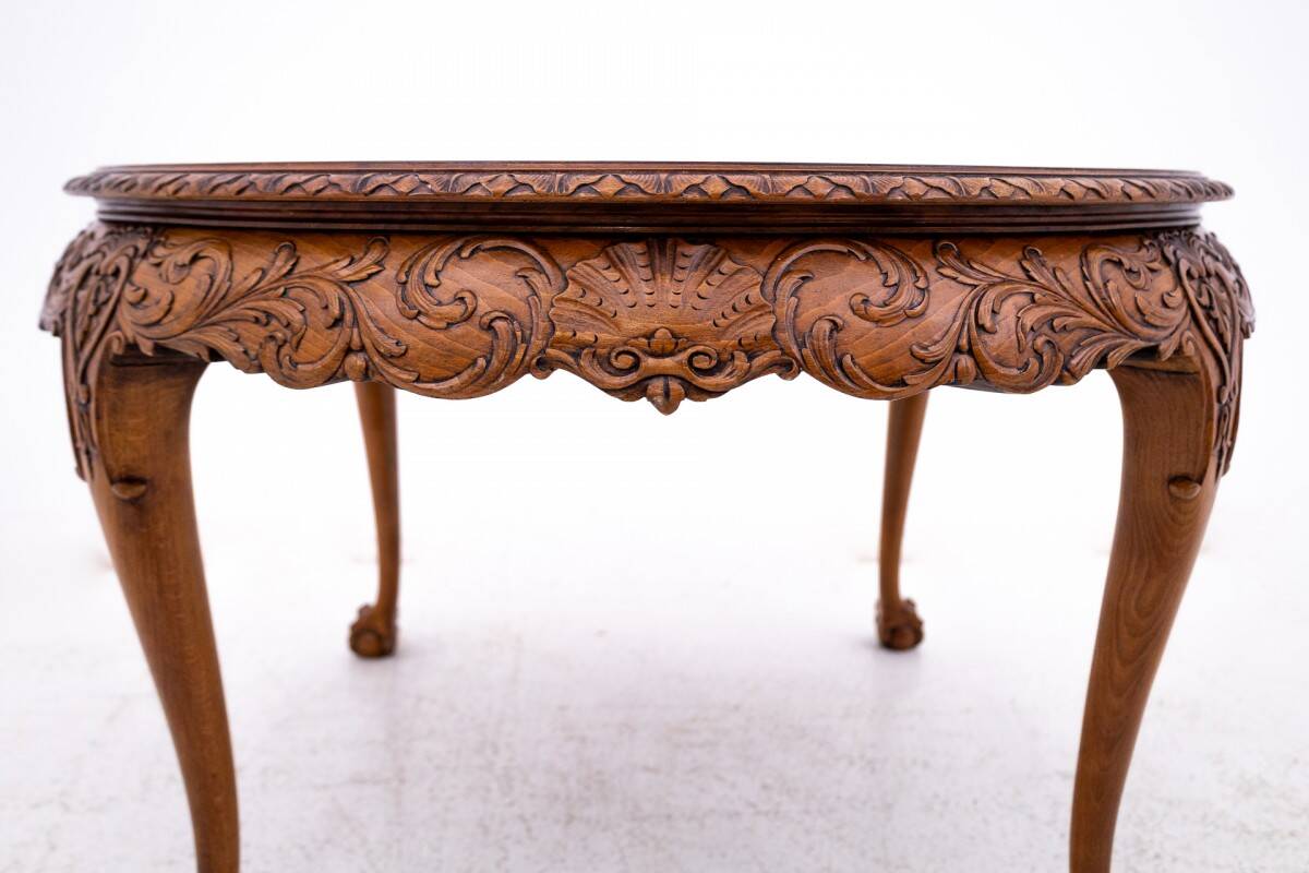 Antique, carved table, Western Europe, around 1910.