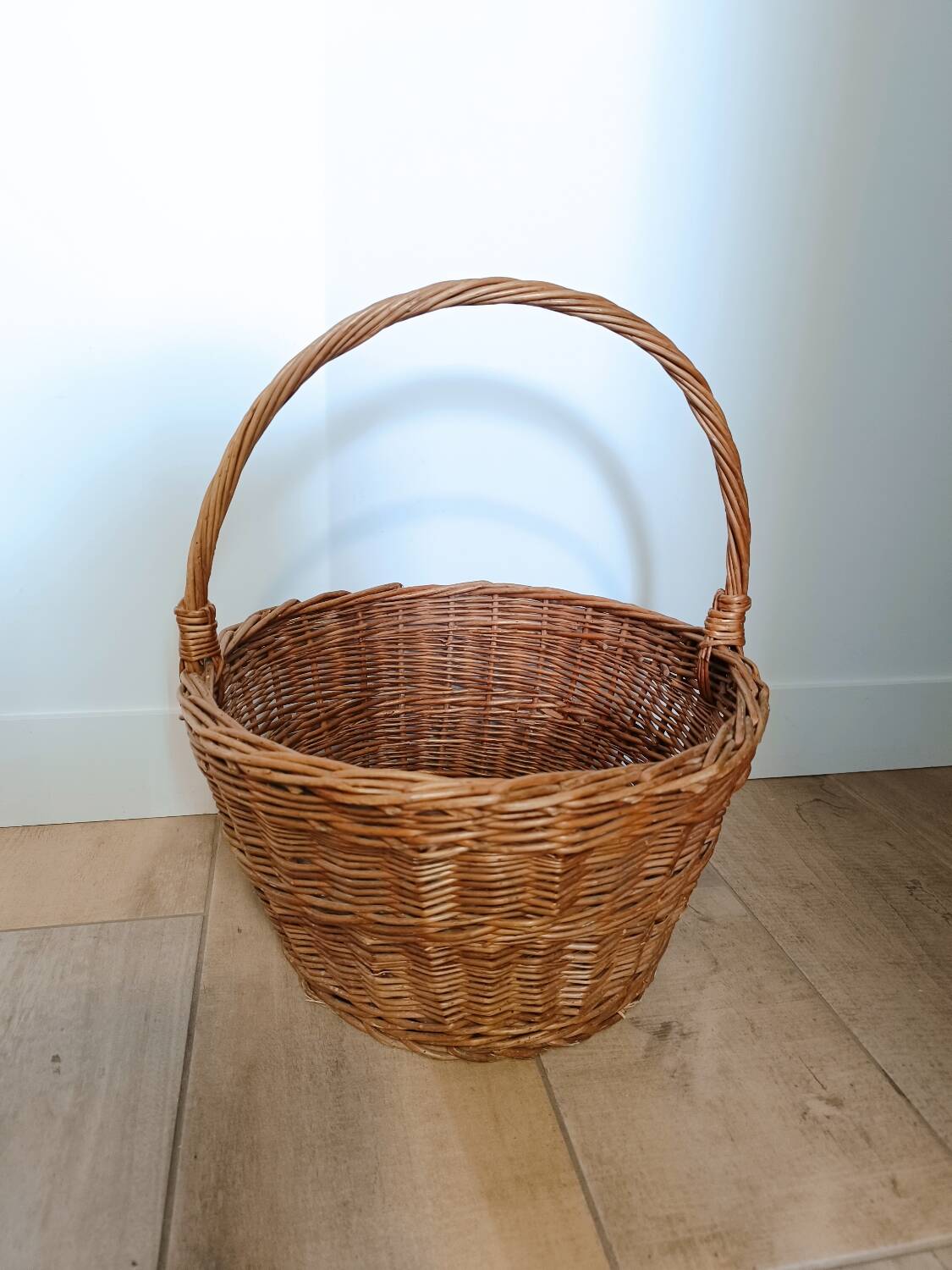 Large round vintage wicker basket