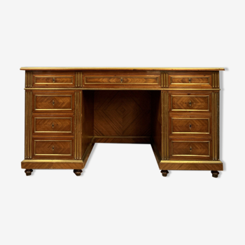 Bureau de centre a caisson Louis XVI en acajou et joncs de cuivre vers 1850
