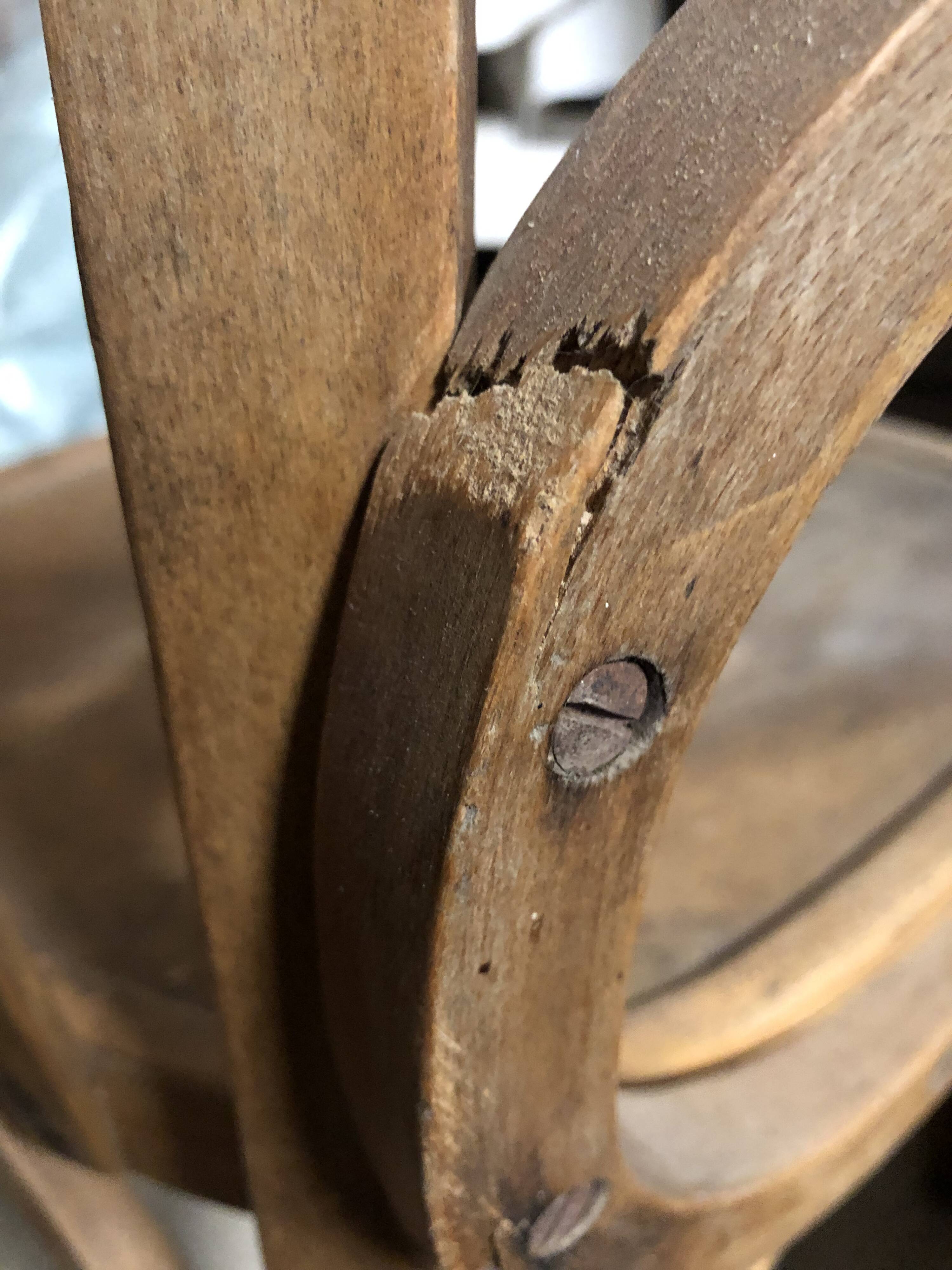 Curved wooden armchair