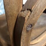Curved wooden armchair