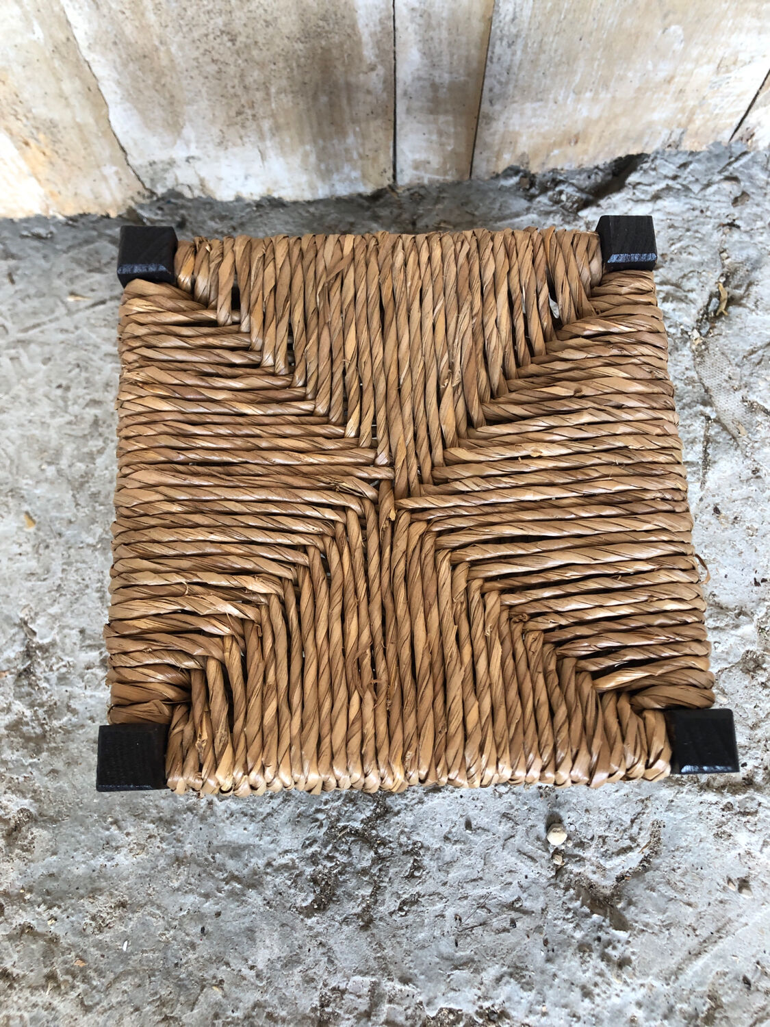 Black wood foot rest stool & vintage mulched seat