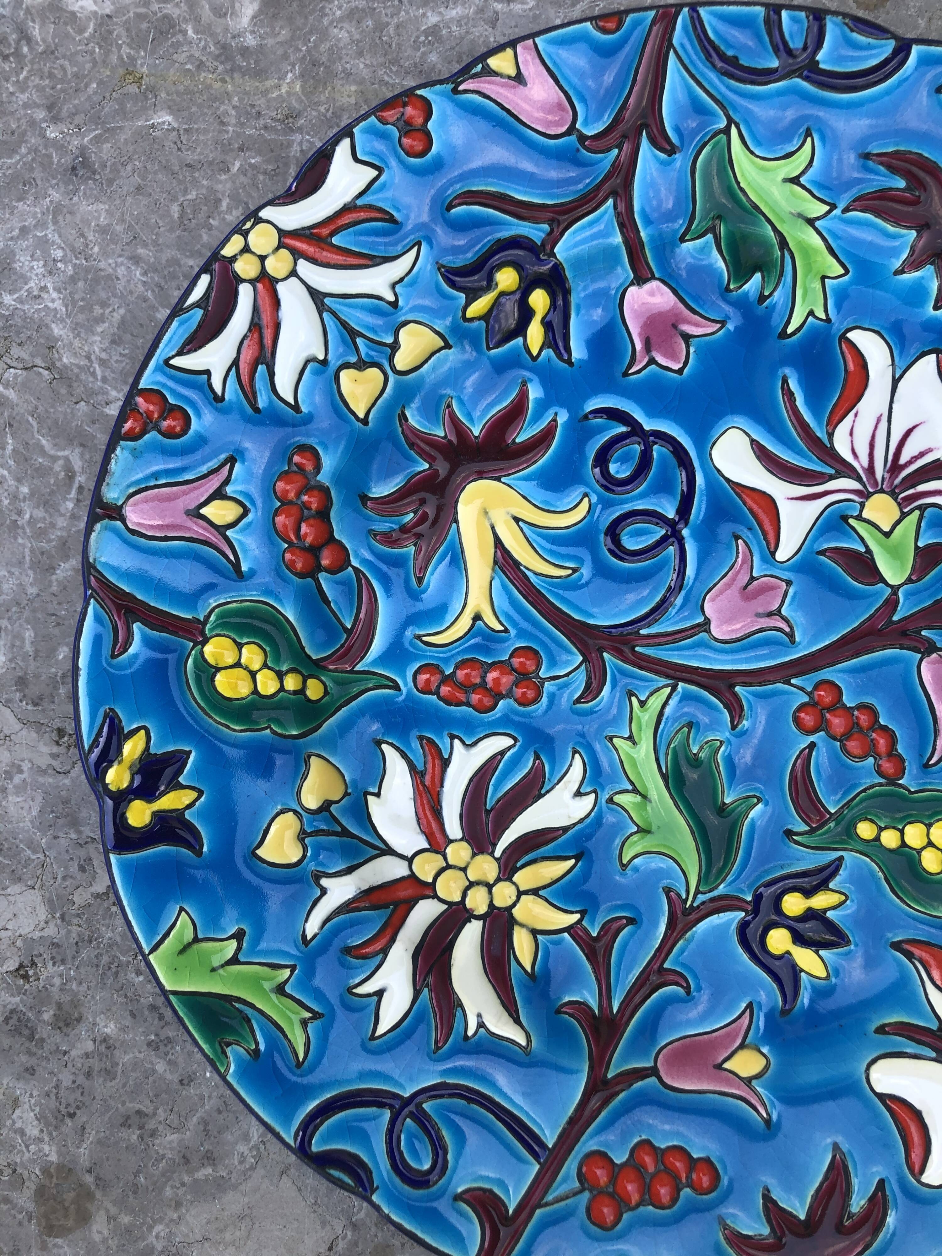 Plate in earthenware has naturalistic décor Longwy emaux