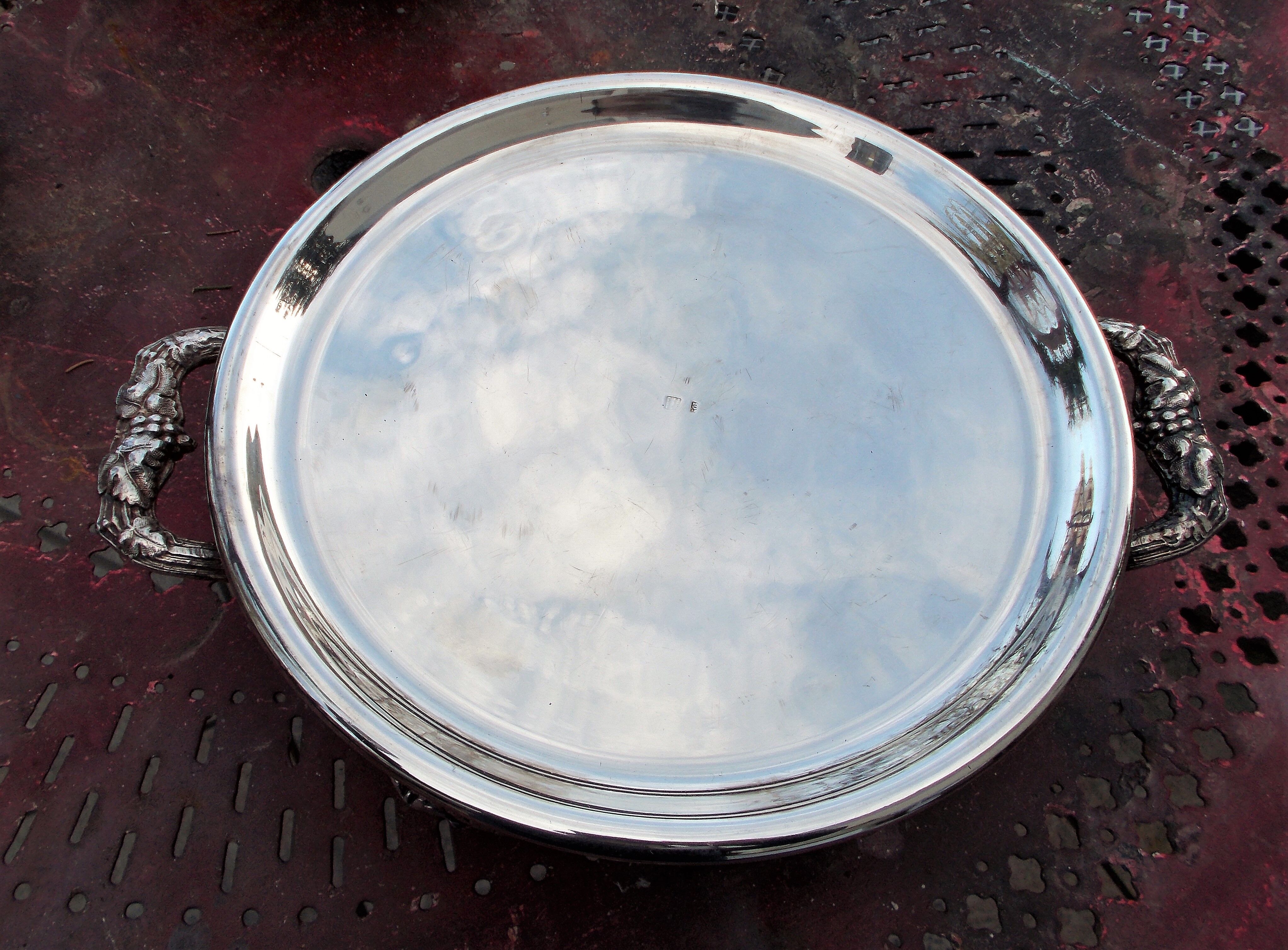 Antique silver-plated metal tealight with vine branch decoration