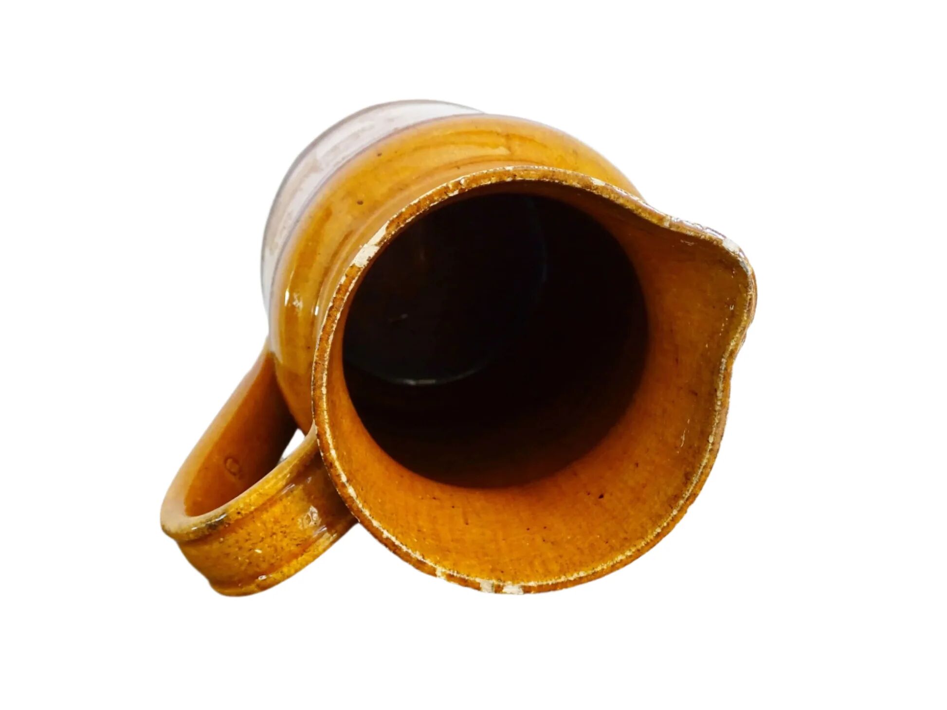 Pichet ancien en faïence française à glaçure orange