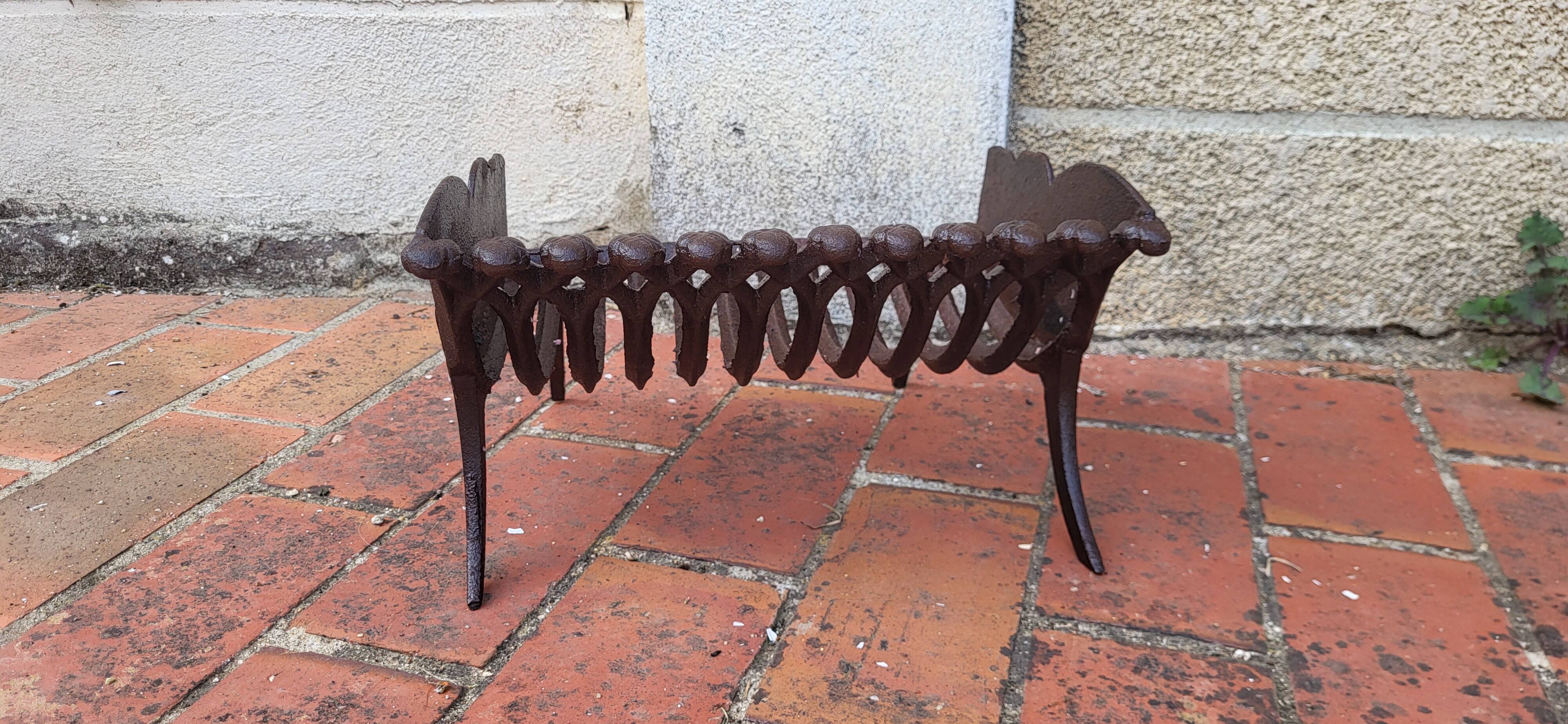 Cast iron fireplace basket log holder