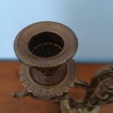 Bronze candlestick with lion head decoration