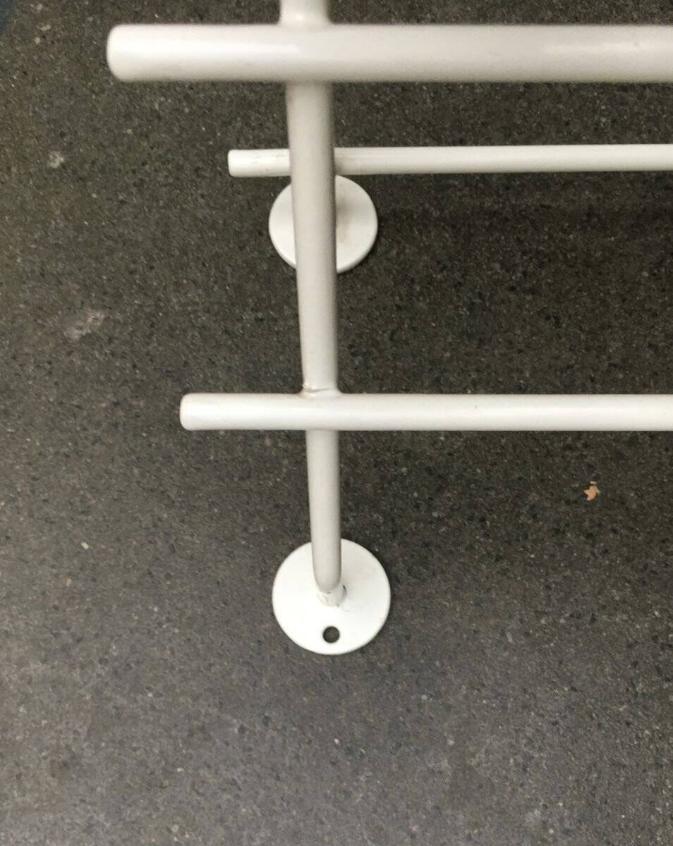 Mid-century modern minimalist metal coat rack from the 1960s.