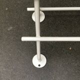 Mid-century modern minimalist metal coat rack from the 1960s.