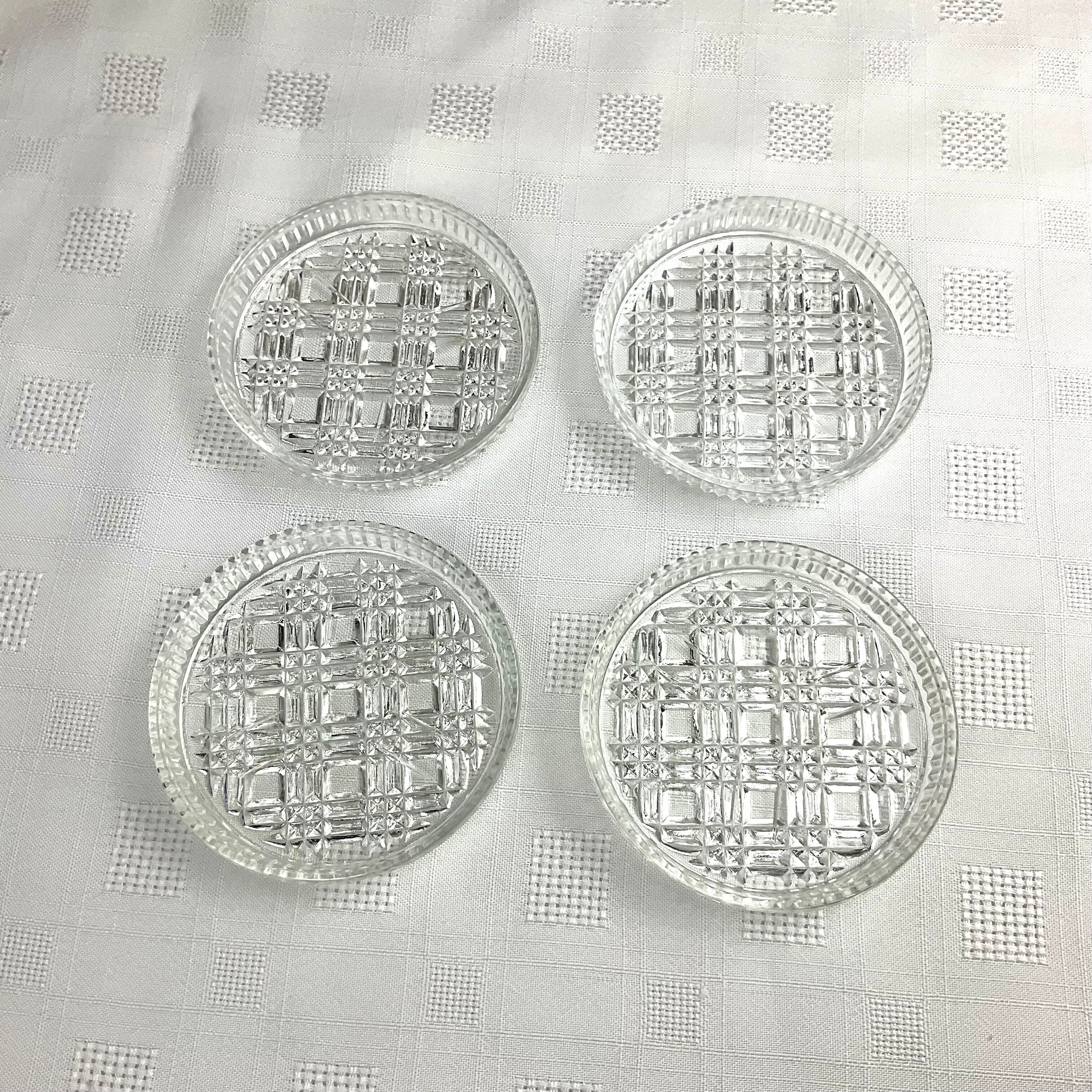 Series of 4 vintage glass coasters