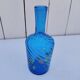 Vintage twisted blue glass carafe with enamel decoration.