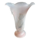 Pink glass vase decorated with tulips