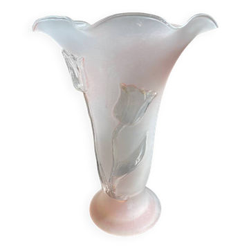 Pink glass vase decorated with tulips