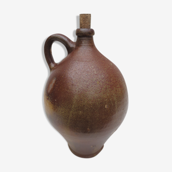 ancient water jug in vitrified sandstone, bulging avc handle