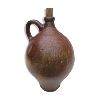 ancient water jug in vitrified sandstone, bulging avc handle