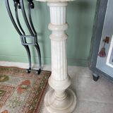 White marble column – sculpted base