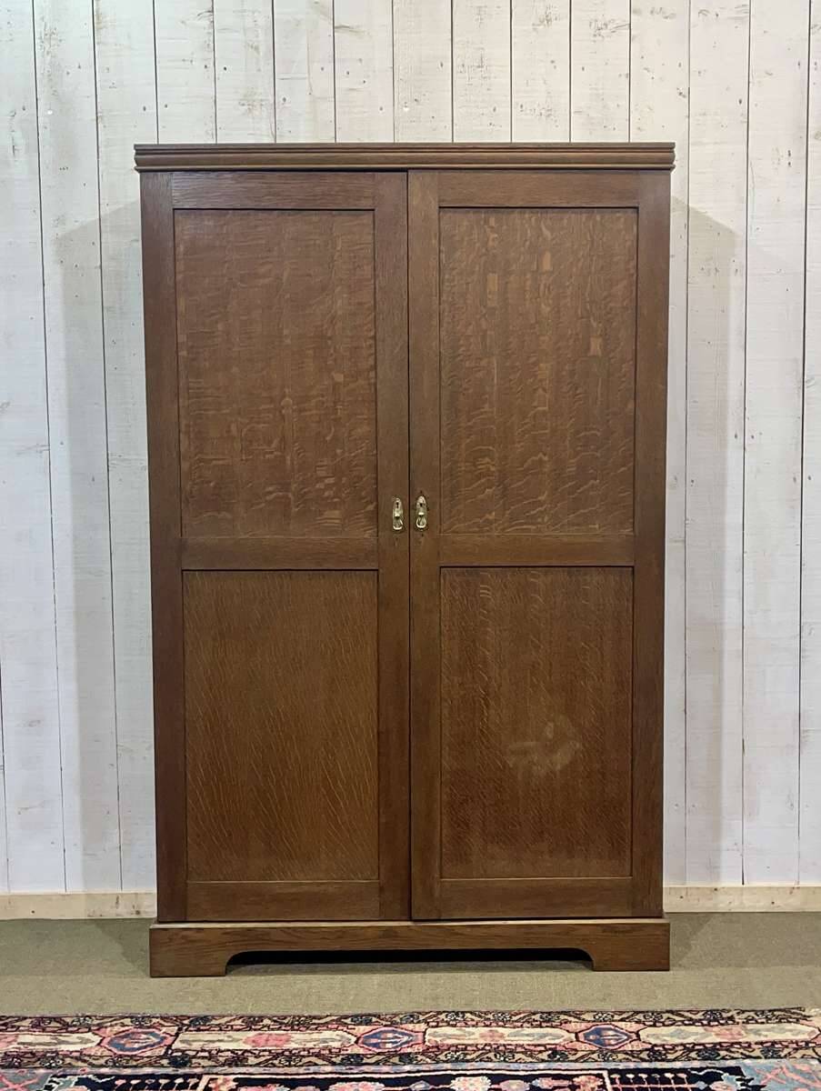 English oak wardrobe from the early 20th century.