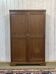 English oak wardrobe from the early 20th century.